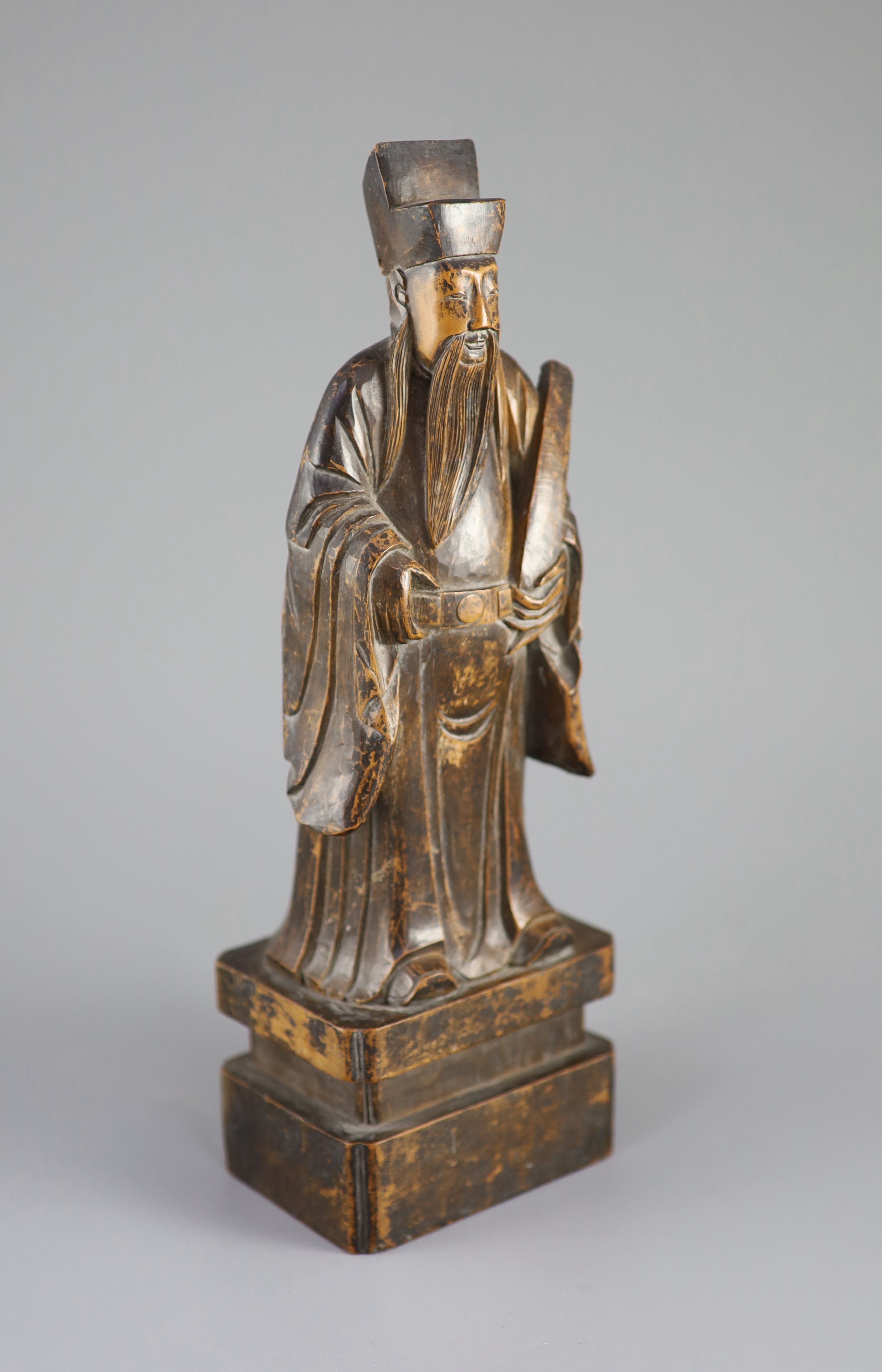 A Chinese boxwood figure of an immortal, 19th century, 29.5 cm high